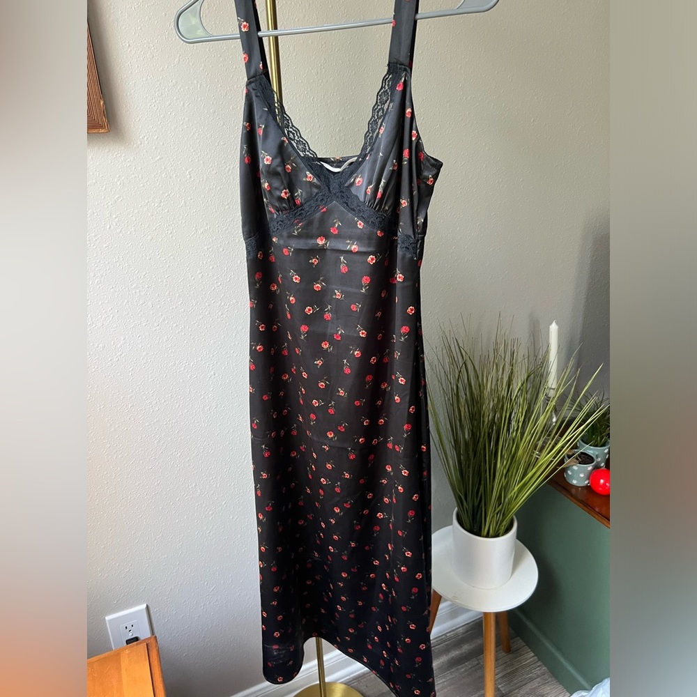 Floral, satin slip dress with lace trim from Altar’d State